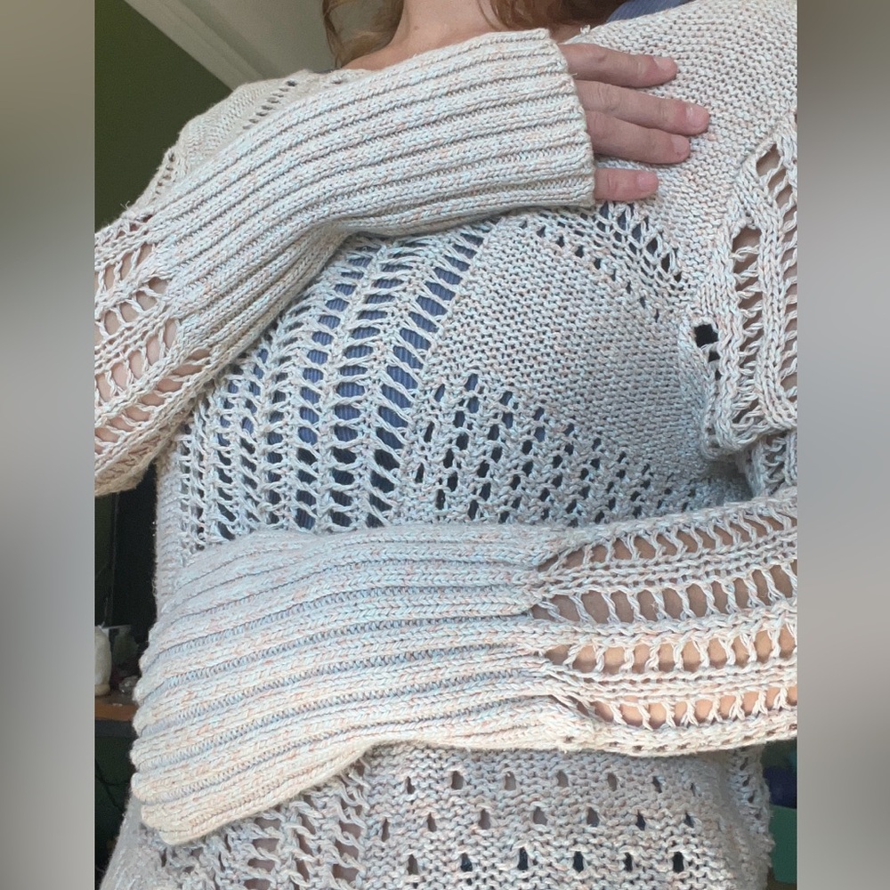 Free people S distressed knit long sleeve with bell sleeves.